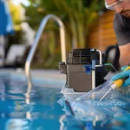 The Key Role of Pool Maintenance Companies in Extending Pool Lifespan technician from Pool maintenance companies checking the water quality