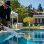 How Professional Pool Cleaning Handles Filter Backwashing and Deep Cleaning Professional pool cleaning water surface